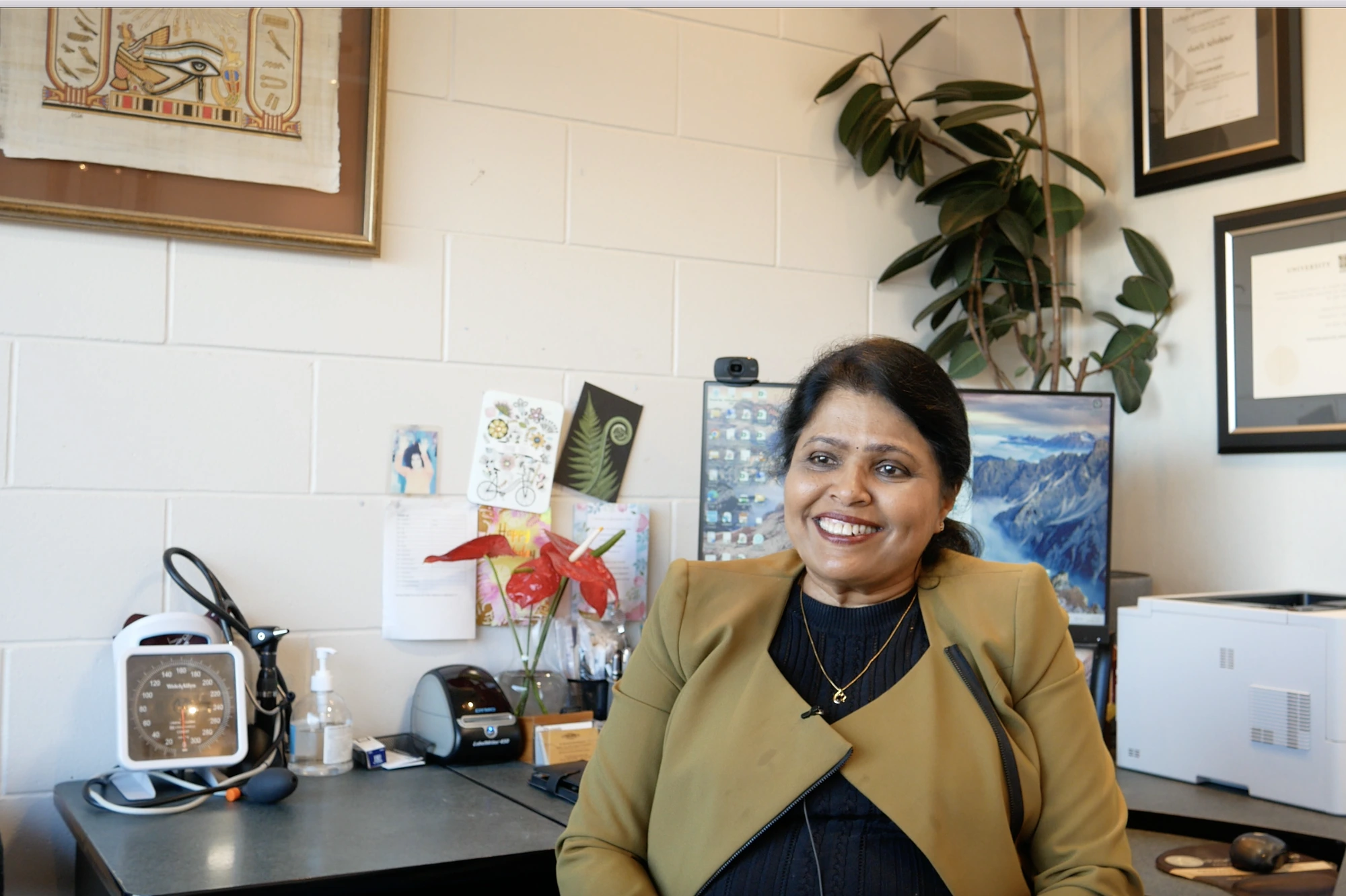 Dr Shanthi Selvakumar smiling in her consulting room